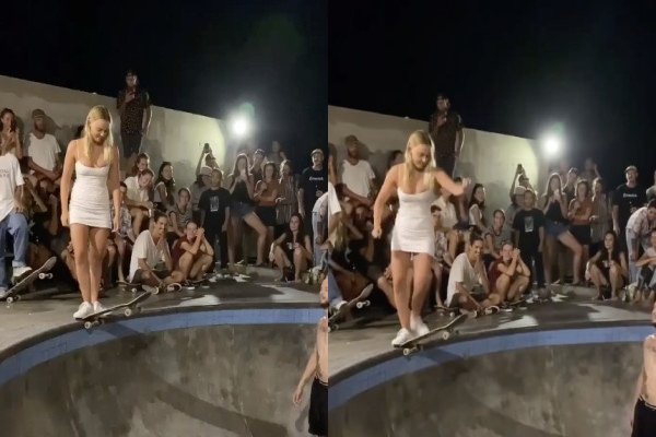 Une blonde descend une rampe de skate
