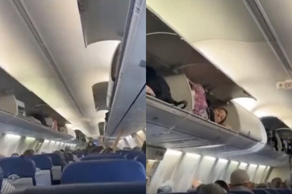 Une passagère d'avion s'allonge dans le compartiment à baggage